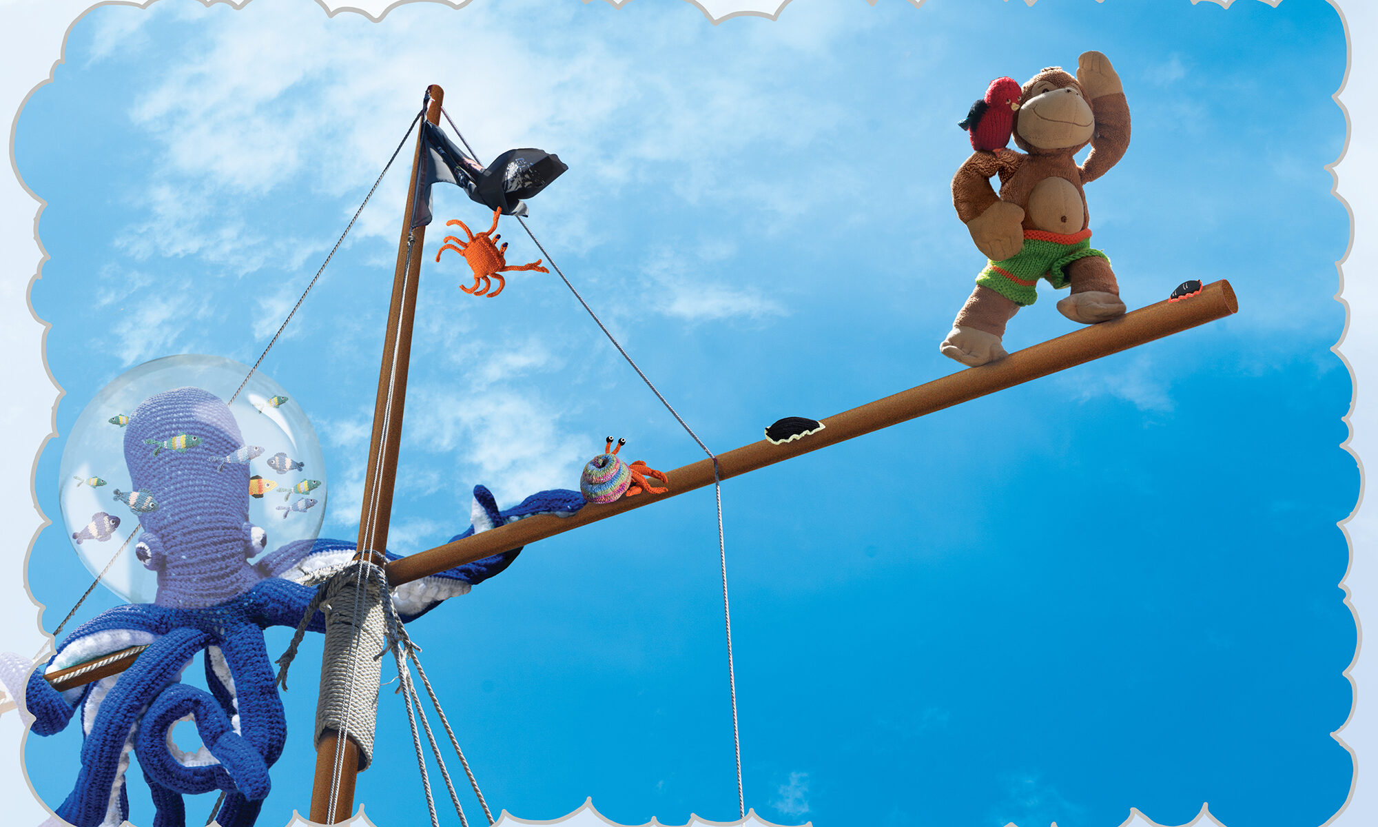 double page spread of Monkey standing on the mast of a pirate ship